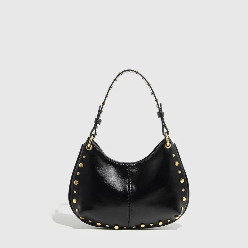 Studded Saddle Shoulder Bag with Gold Accents.